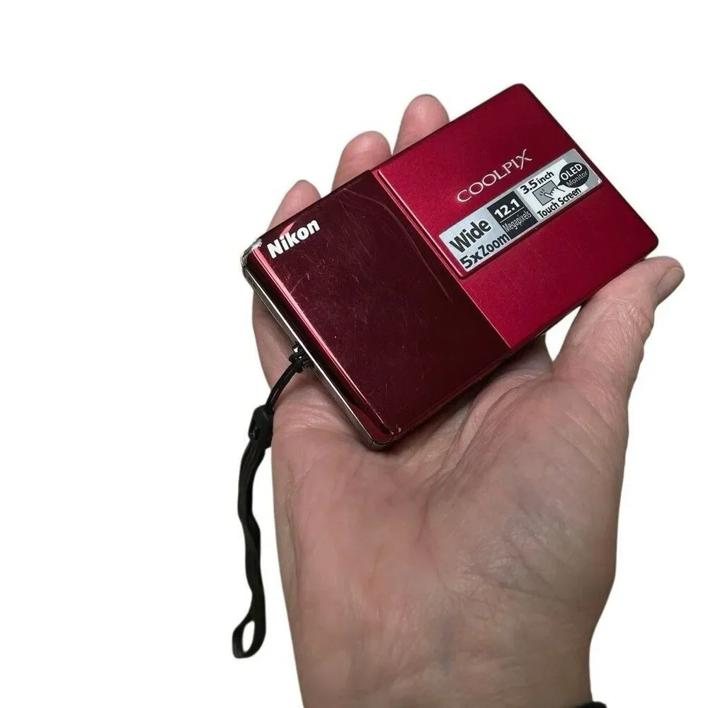 Nikon Coolpix S70‎ 12.1 MP Red Digital Camera Bundle Case 8gb SD & Charger Works